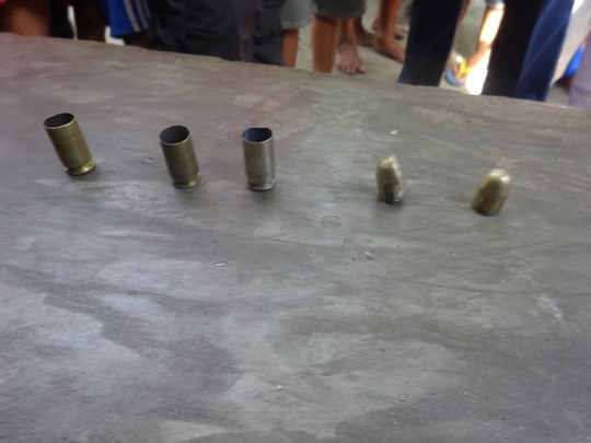 assorted fired cartridge on a table