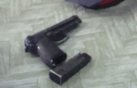 beretta 9mm on the table with magazine
