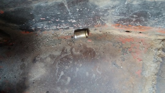 fired cartridge on the ground