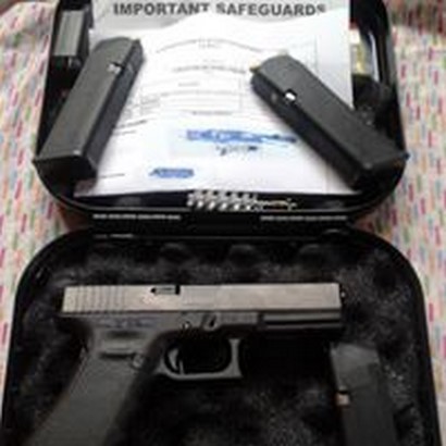 glock 17 placed in the table with case