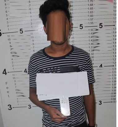mugshot of a suspect in a stripe t-shirt preview