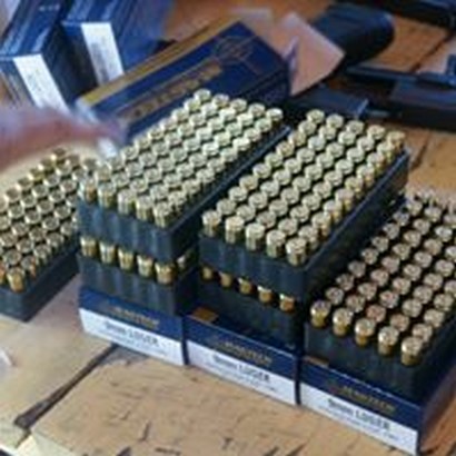 sets of 9 mm bullets on a table