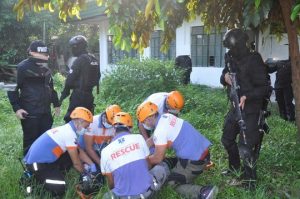 swat personnel with rescue team